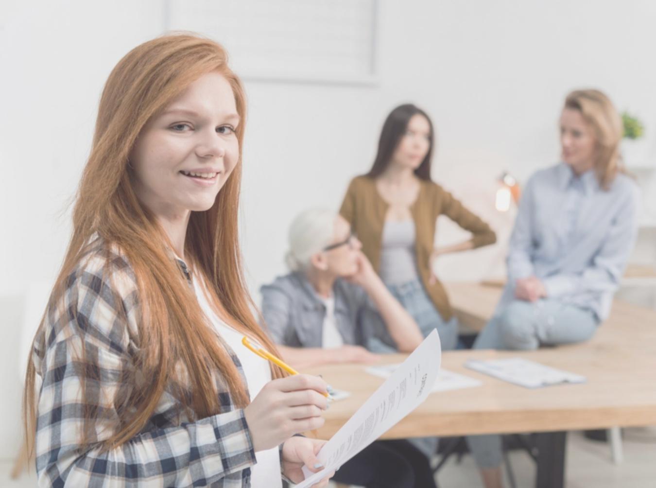Students reviewing financial documents and budget spreadsheets